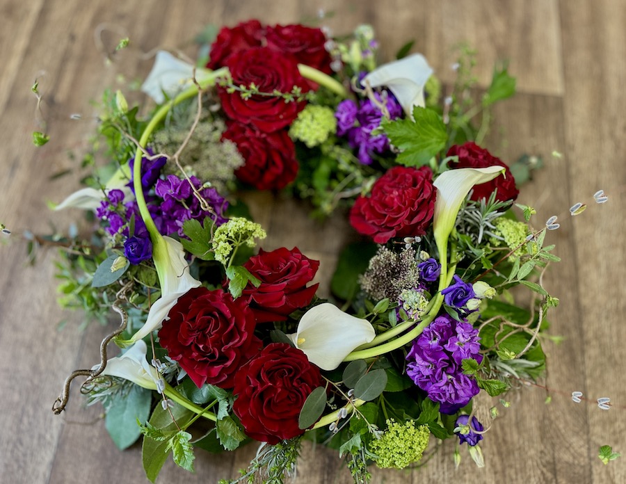 Modern Red Wreath modern red wreath on wooden floor