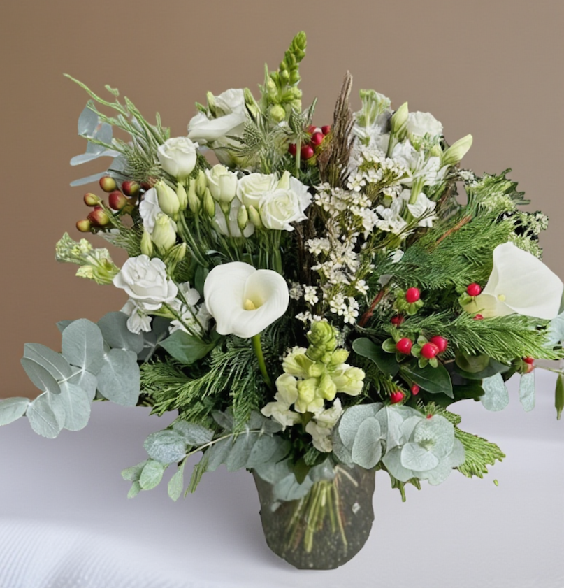 winter woodland bouquet in a vase.