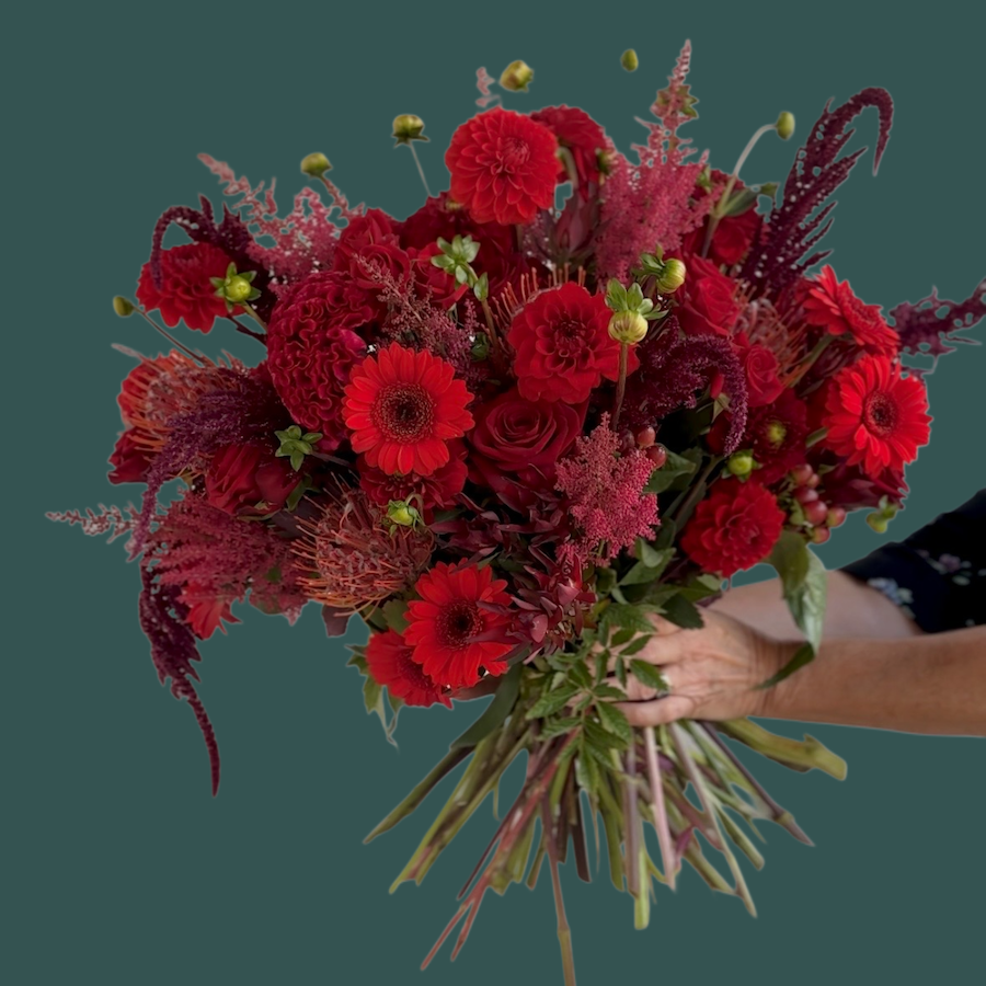 Ruby Ruby is a red and hot pink bouquet of flowers that is whimsical and romantic. The perfect gift for an anniversary or for your love.